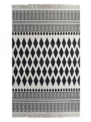 Tapis blanc et noir au losanges 160 X 250 CM - 65 €