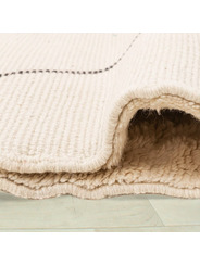 fluffy cream rug - 249 €