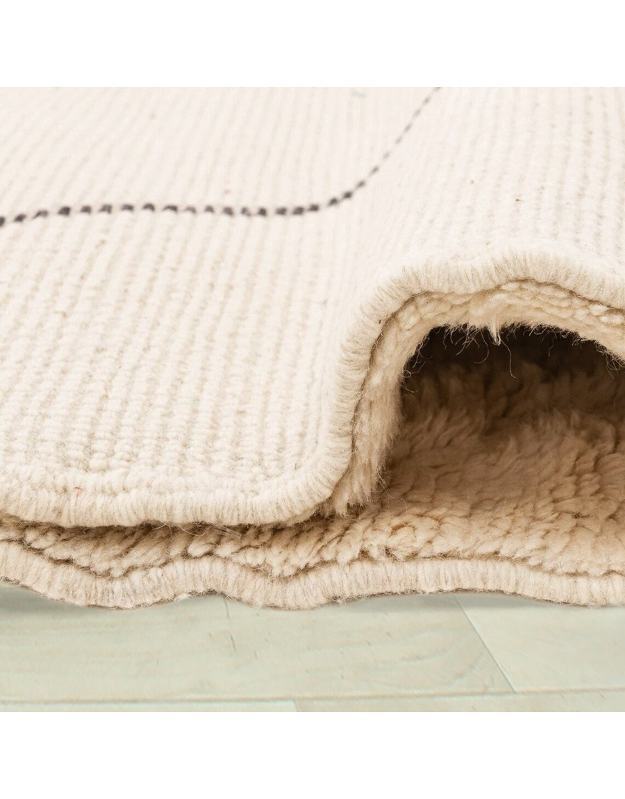 fluffy cream rug - 249 €