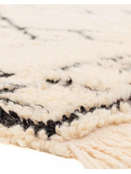 black and beige rug - 209 €