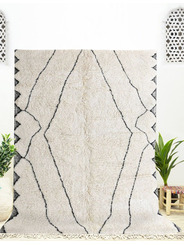 cream and black rug - 240 €