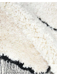 cream and black rug - 240 €