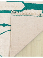 beige and green rug - 329 €