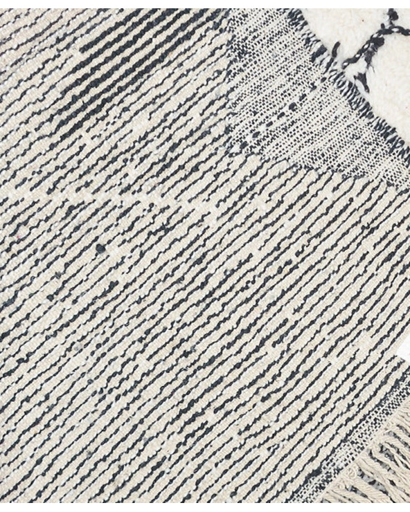 black and cream rug - 299 €