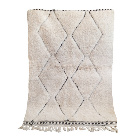 tapis en laine beige - 299 €