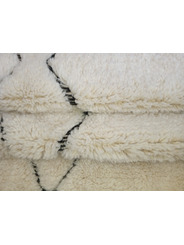 tapis en laine beige - 299 €