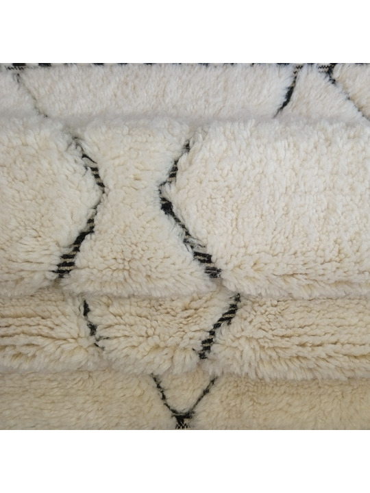 tapis en laine beige - 299 €