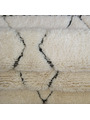 tapis en laine beige - 299 €