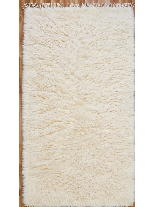 Tapis shaggy beige - 379 €
