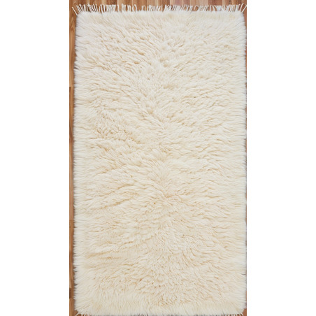 Tapis shaggy beige - 379 €