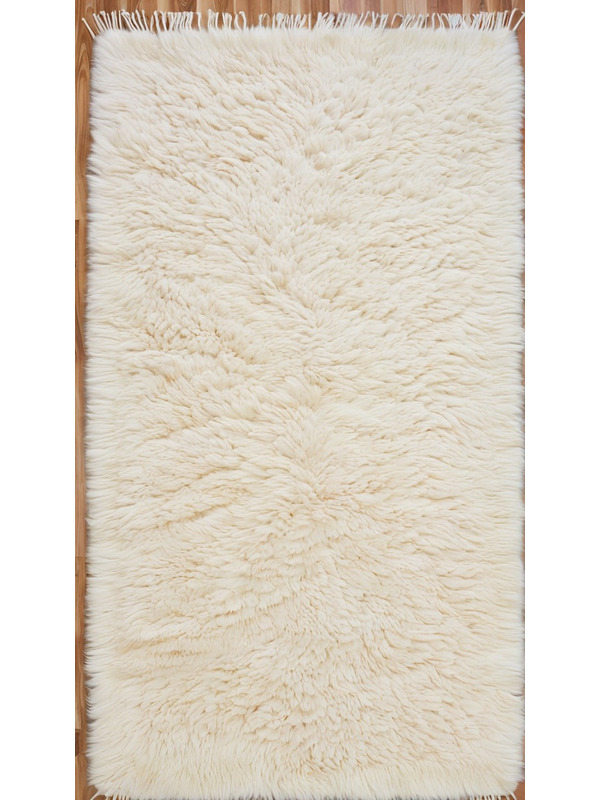 Tapis shaggy beige - 379 €