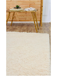 Tapis shaggy beige - 379 €
