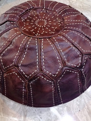 Brown handmade leather pouf with stitches - 147 €